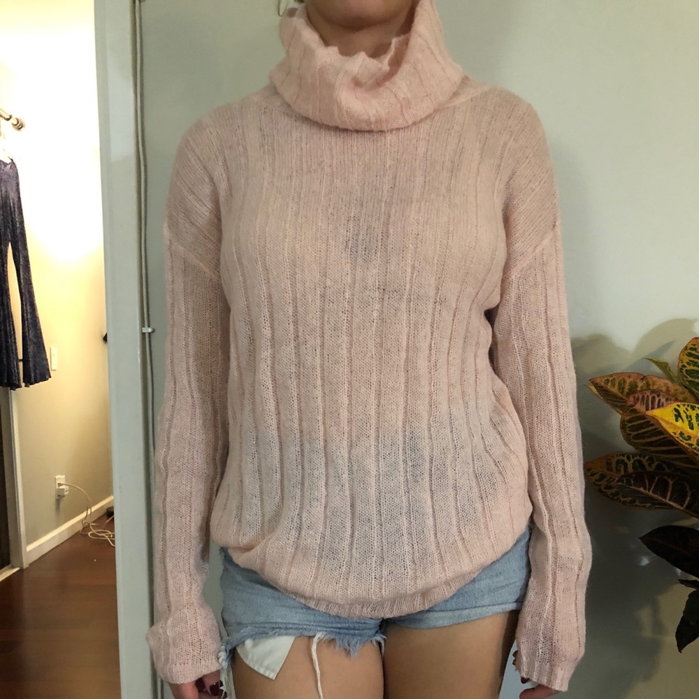 Pink turtleneck sweater